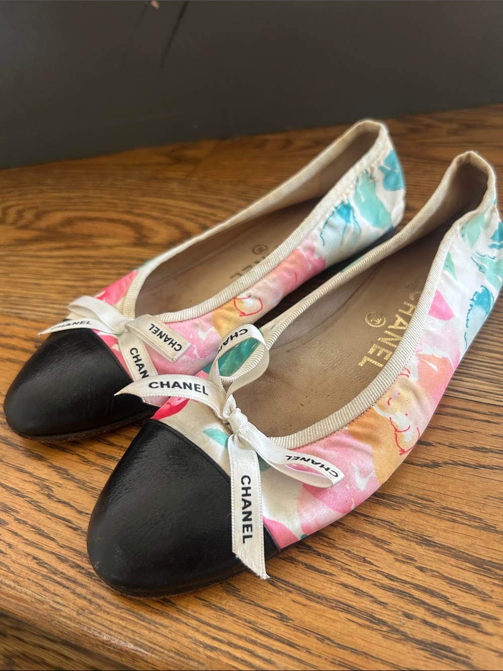 CHANEL Multicolor Floral Ballet Flats with Black Cap Toe and Branded Bow